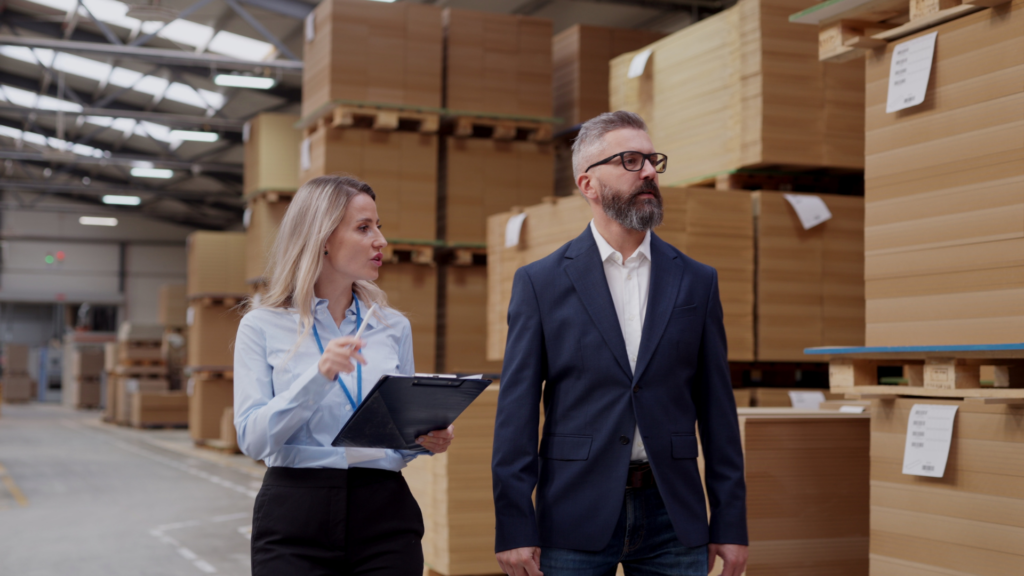 Warehouse leaders reviewing operations during a post-implementation assessment to identify continuous improvement opportunities without disrupting daily workflows.